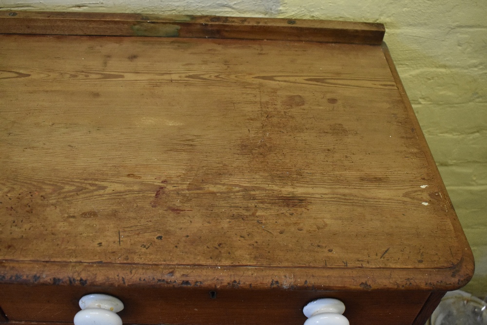 A Victorian pine chest of two rows of four graduated long drawers, with ceramic handles, on plinth - Image 3 of 7