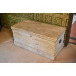 A 19th century large pine blanket box, height 52cm, width 116cm, depth 58cm. PROVENANCE: The Raymond