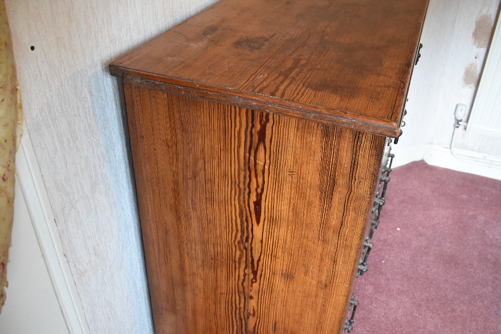 A late Victorian pitch pine chest of two short and three long drawers, on carved block feet, - Image 3 of 8