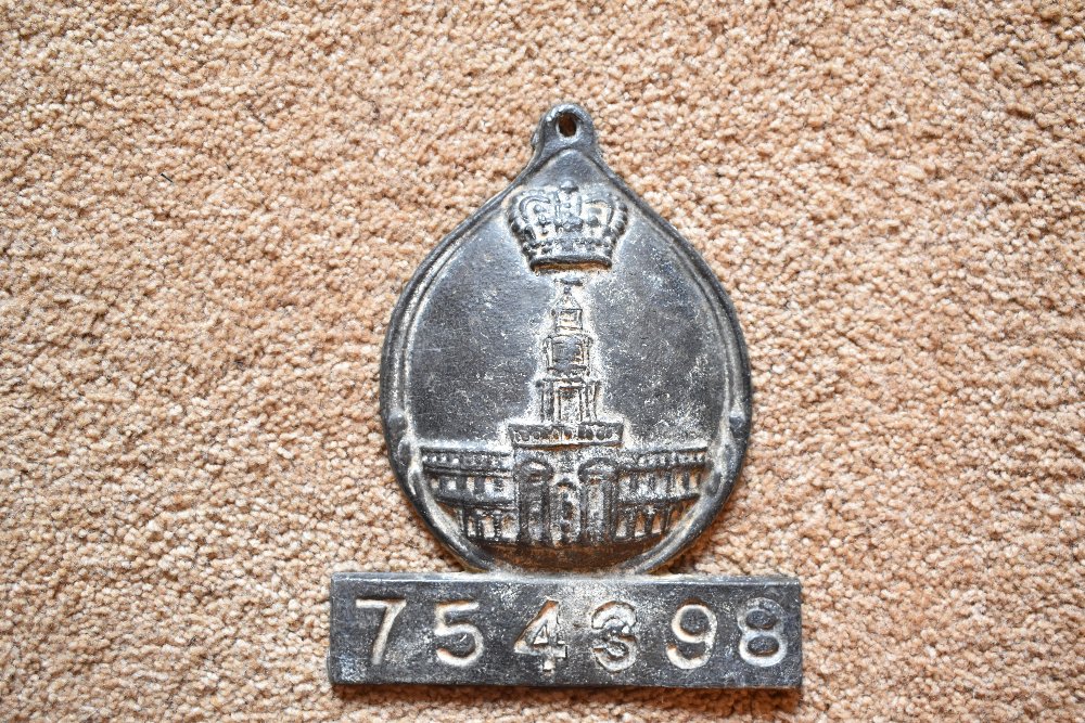 A cast lead fire mark for Royal Exchange Association (1720-1968), with policy no.754398, height