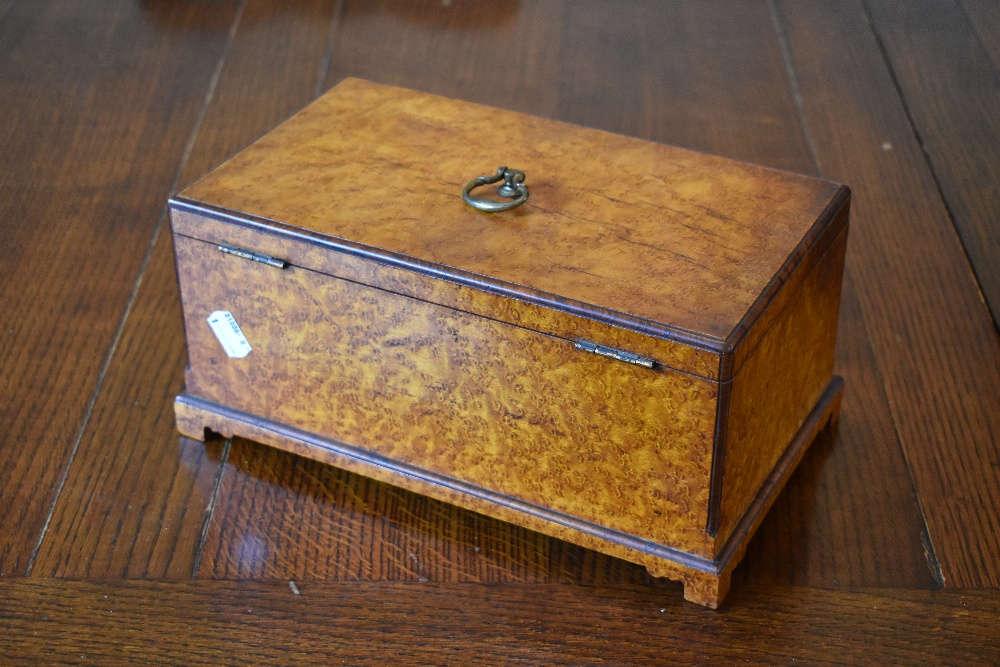 A Victorian amboyna box, with internal tray, on bracket feet, height 14cm, width 13cm, depth 18cm. - Image 2 of 3