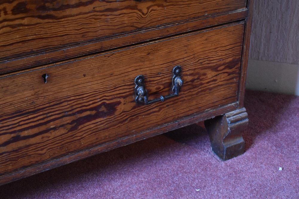 A late Victorian pitch pine chest of two short and three long drawers, on carved block feet, - Image 6 of 8