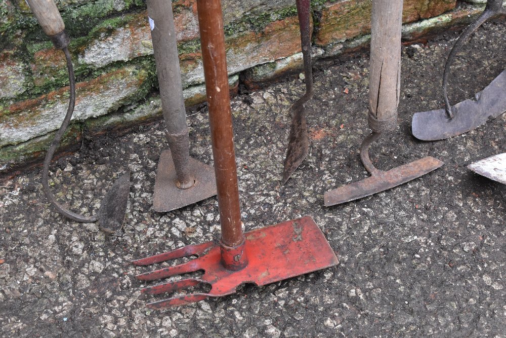 A collection of twelve vintage garden hoes of varying styles. PROVENANCE: The Raymond Rush - Image 2 of 4