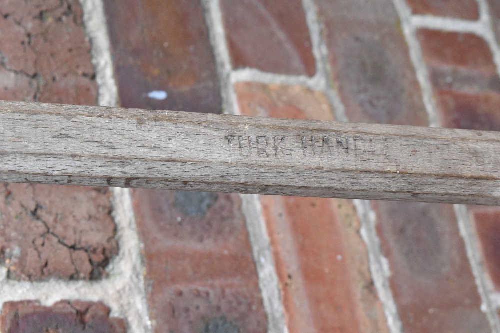 A vintage red painted wood and iron hay rake, two scythes, two potato forks, a fork and a fork head. - Image 6 of 8