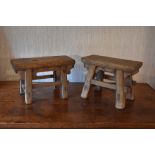 A near pair of Chinese hardwood stools, with rectangular tops on moulded legs, height 12cm, length