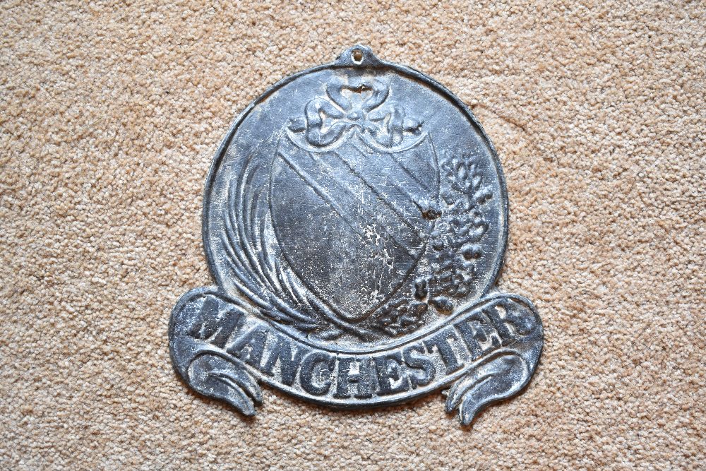 A cast lead fire mark for Manchester, height 15cm. PROVENANCE: The Raymond Rush Collection. Mr