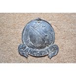 A cast lead fire mark for Manchester, height 15cm. PROVENANCE: The Raymond Rush Collection. Mr