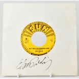 ELVIS PRESLEY; a signed 7" single sleeve with later added 7" single,