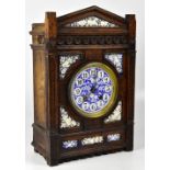An Aesthetic Movement French oak mantel clock,