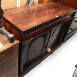 A Victorian mahogany chiffonier with egg and dart carved frieze above inverted cushion drawer and a