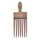 A late 19th/early 20th century African tribal comb with seven tines,