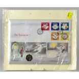 A 2003 Isle of Man 'The Snowman' Christmas coin first day cover featuring an encapsulated 'The