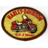 A replica Harley Davidson 'Ride a Winner' plaque.