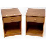A pair of Stag teak bedside cabinets, each with a single drawer above open recess,