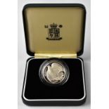 ROYAL MINT; a 1995 WWII silver proof £2 coin, encapsulated, with certificate, in presentation box.