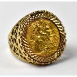A George V 1911 half gold sovereign mounted in a 9ct gold ring, size P, approx 9g.