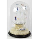 A Victorian spun glass model of a tall-masted sailing boat, in white, turquoise, orange,