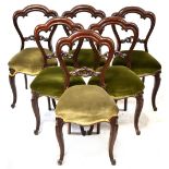 A set of six Victorian mahogany dining chairs,