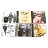 VARIOUS ARTISTS; six signed CDs including Joni Mitchell, Burt Bacharach and Robert Plant (6).