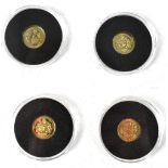 Four 9ct gold commemorative coins in the form of miniature crowns, each 1g,