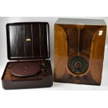 A 1930s Columbia record player in a brown Bakelite case, with oak interior,