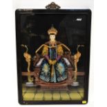 A late 19th/early 20th century reverse oil painting on glass depicting a young emperor sat on a