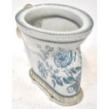 A late 19th/early 20th century blue and white transfer decorated toilet,