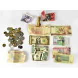 A quantity of 20th century British and foreign coins and banknotes including American dollars,