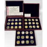 A cased set of gold plated collectors' coins by Windsor Mint, of the ships of the Royal Navy,