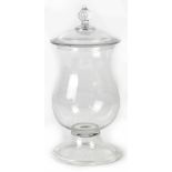 A Victorian clear glass leech jar of baluster form, with a domed lid and faceted knop,