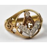 A Masonic 9ct yellow gold ring set with small white stones, size Q, approx 5.3g.