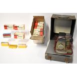 A vintage Aldis portable slide projector in travel case with a large quantity of unused slides,