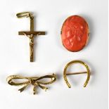 A 9ct yellow gold crucifix, a 9ct yellow gold bow brooch, approx 7g,