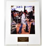 JIMI HENDRIX; a signed photograph of Jimi Hendrix and band at Woodstock Festival, August 1969,