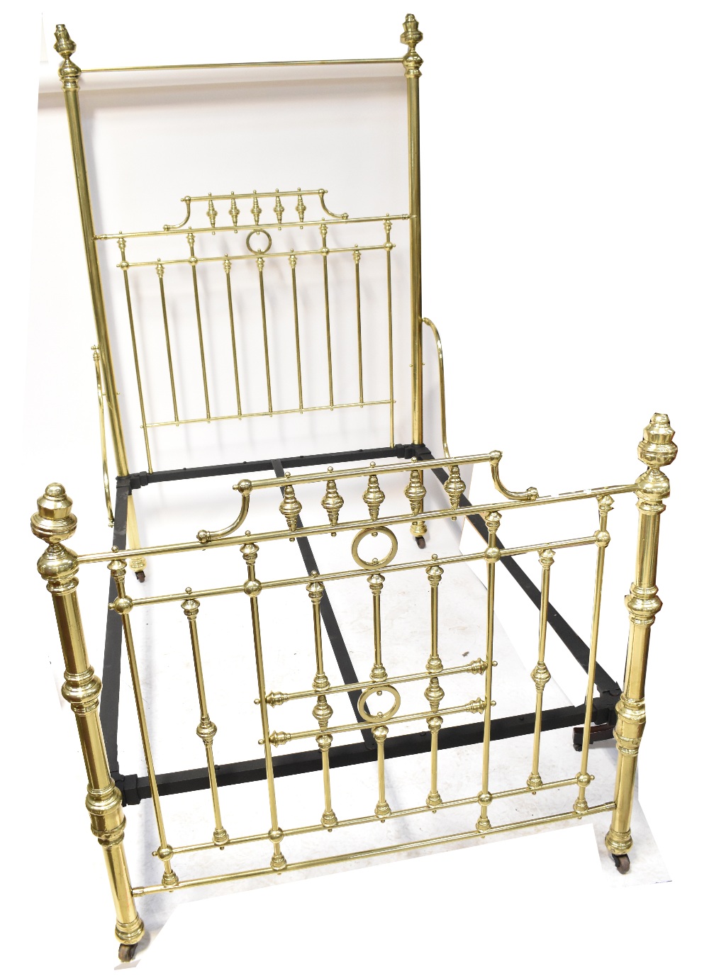 A brass double bedstead, purportedly purchased from 'Seventh Heaven',