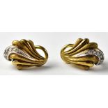 A pair of 9ct gold and diamond clip-on earrings, the earrings of shell form,