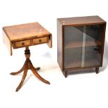 A small mid-20th century bookcase with sliding glazed doors, and a reproduction side table,