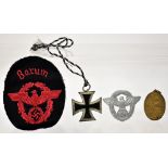 A WWII Iron Cross Second Class, a WWII German Police cloth patch,