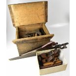 A collectors' lot comprising seven iron cobblers' shoe lasts and stand,