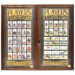 Two framed and glazed displays of John Player & Sons cigarette cards,