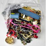 A large quantity of mixed antique, vintage and modern costume jewellery to include brooches,