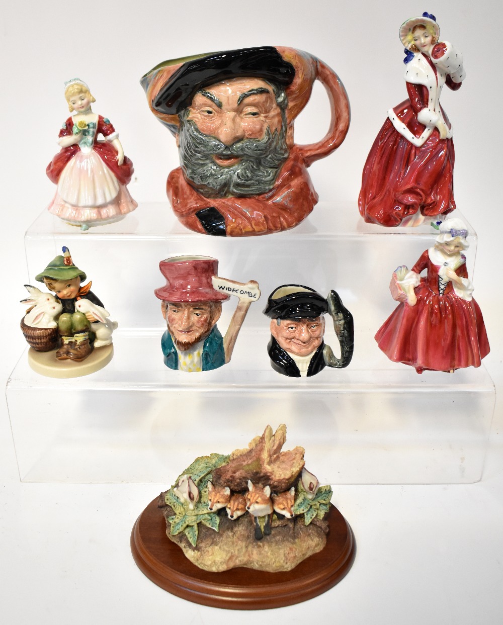 Various modern pottery and porcelain collectibles to include three Royal Doulton figures,