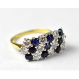 An 18ct gold diamond and sapphire cluster ring,