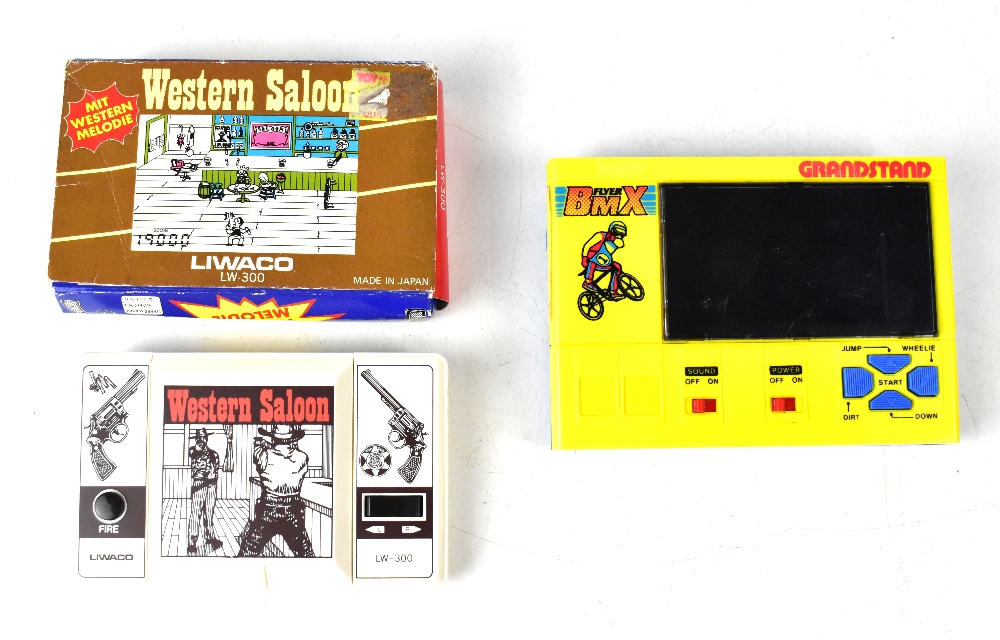 Two vintage 1980s handheld digital video games to include Grandstand BMX Flyer with instruction