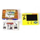 Two vintage 1980s handheld digital video games to include Grandstand BMX Flyer with instruction