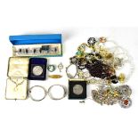 A quantity of antique and vintage costume jewellery to include watches, gold brooch, gold pendant,