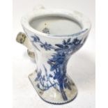 DOULTON & CO; a late 19th/early 20th century blue and white transfer decorated toilet,