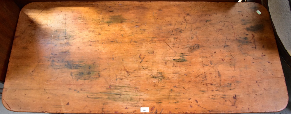 An early 20th century rectangular topped schoolroom writing table, top with ink marks and graffiti, - Image 2 of 2