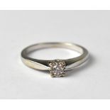 A 9ct white gold solitaire ring.