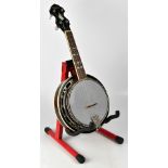 OZARK; a ukulele banjo with inlaid mother of pearl detail to finger board and tailpiece,